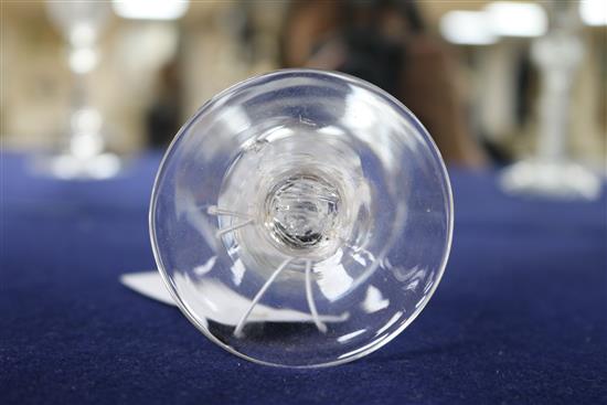 A wine glass, c.1750, with flared bowl, over a knopped airtwist stem, 6.75in.